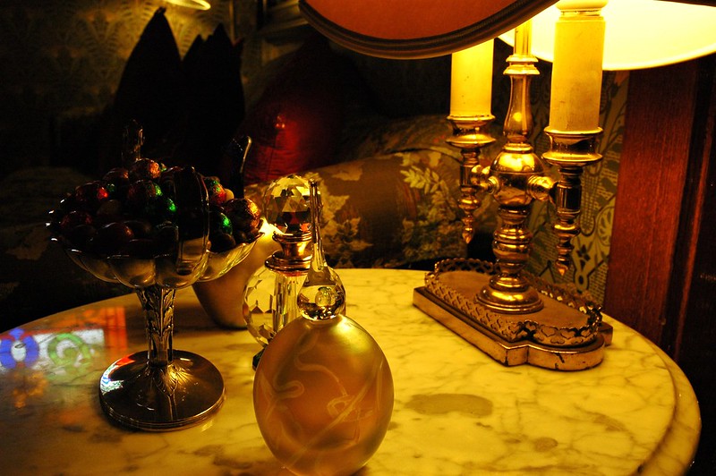 Picture of table with perfume bottles