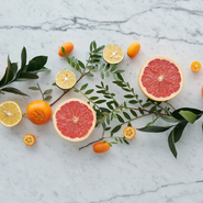 Citrus fruits and herbs on a marble counter Picture
